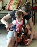 Bethy playing violin with Sarah